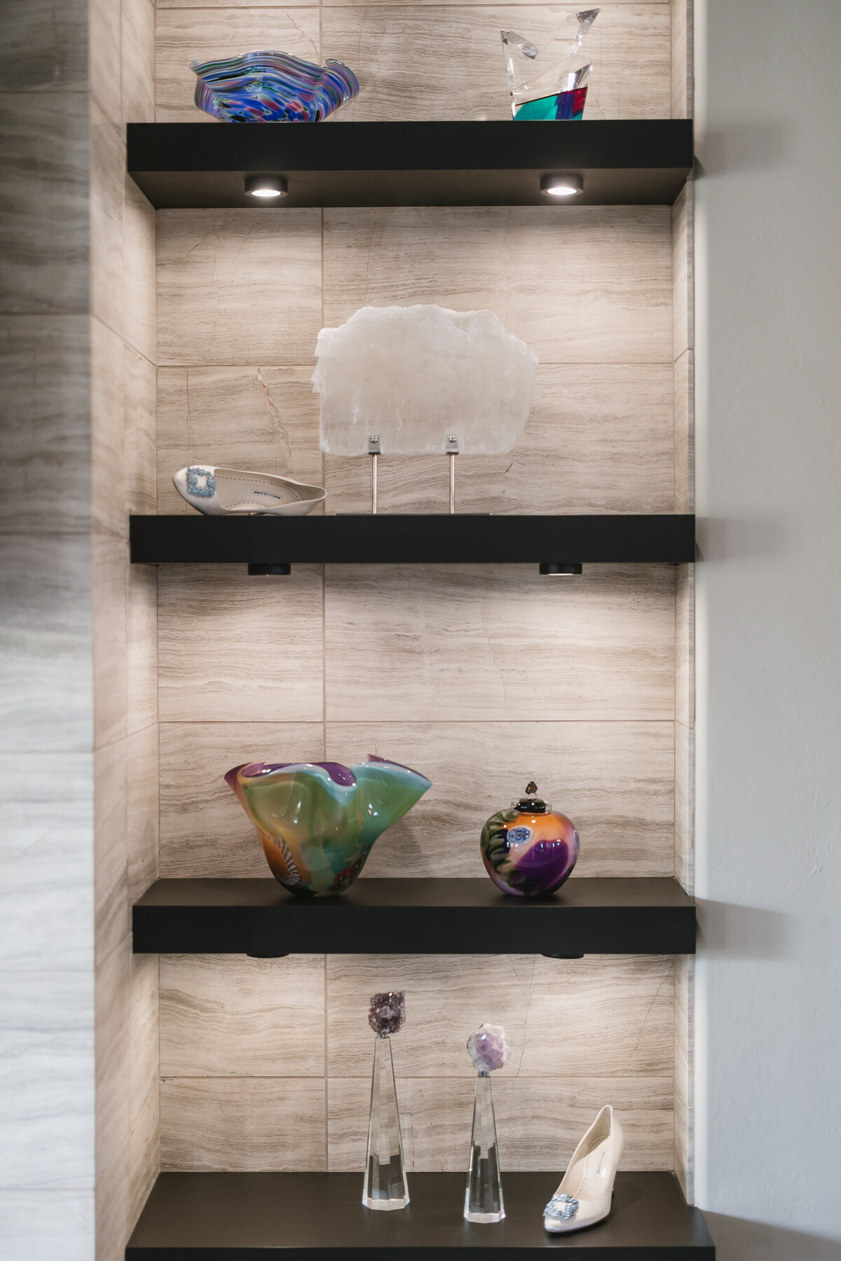 Wedding day shoes on styled shelves