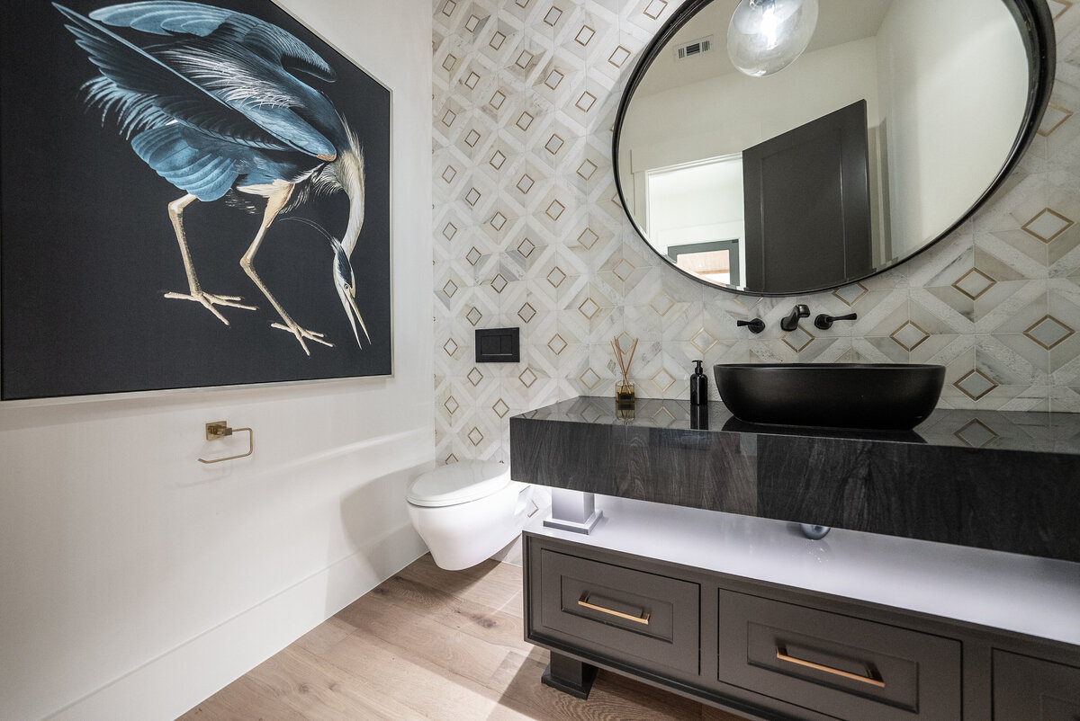 Bold black bathroom in Southlake luxury spec home
