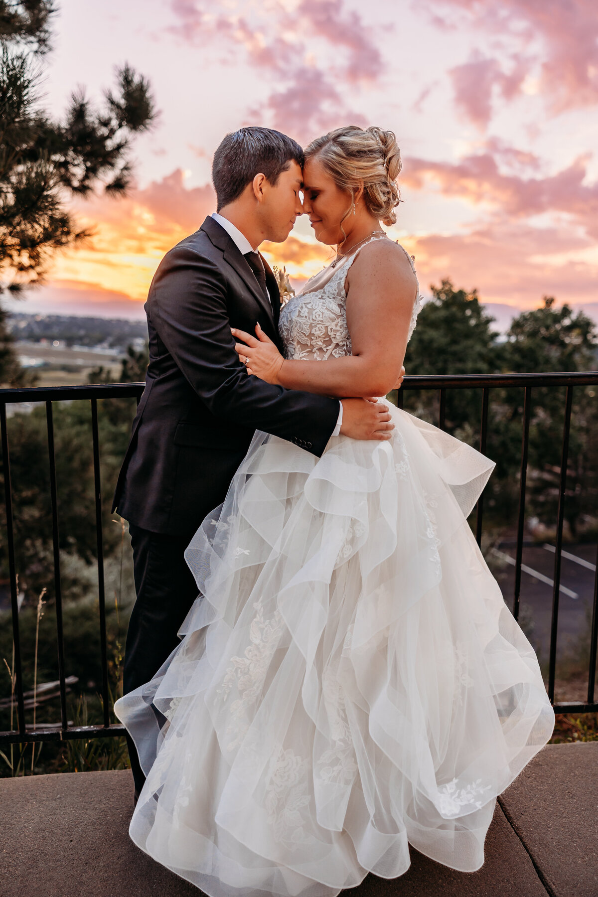 Denver Wedding Photographer captures bride and groom during sunset portraits