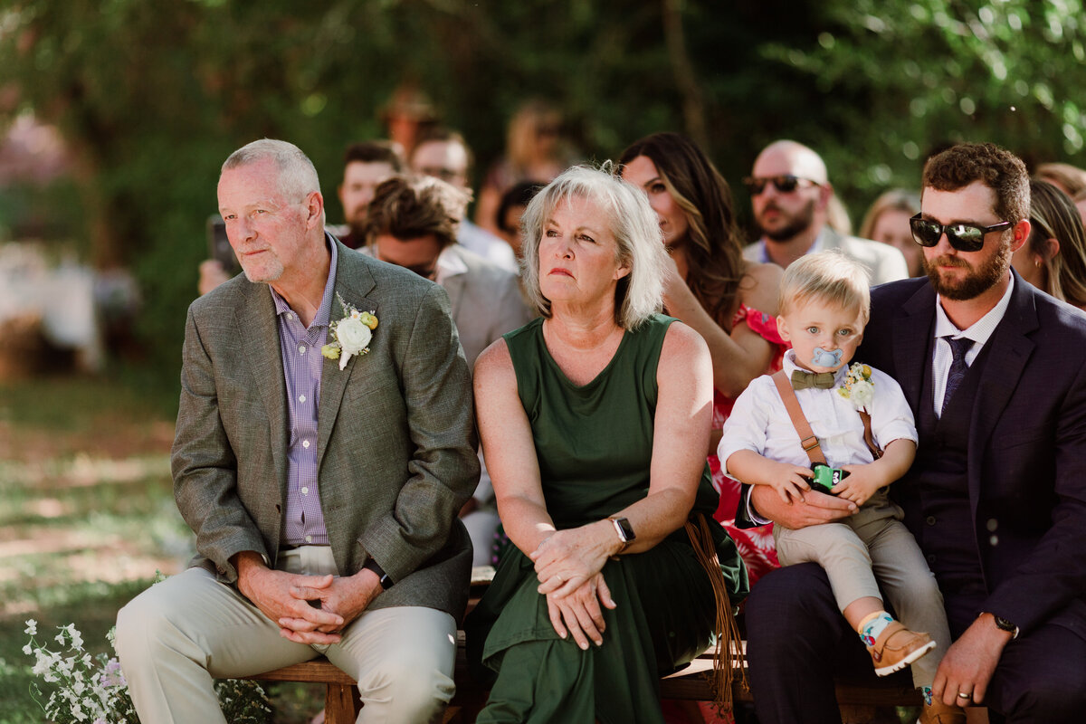 Guests at outdoor wedding ceremony at Dallenbach Ranch Colorado