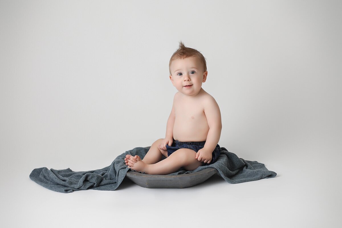 8 month old boy in blue bowl