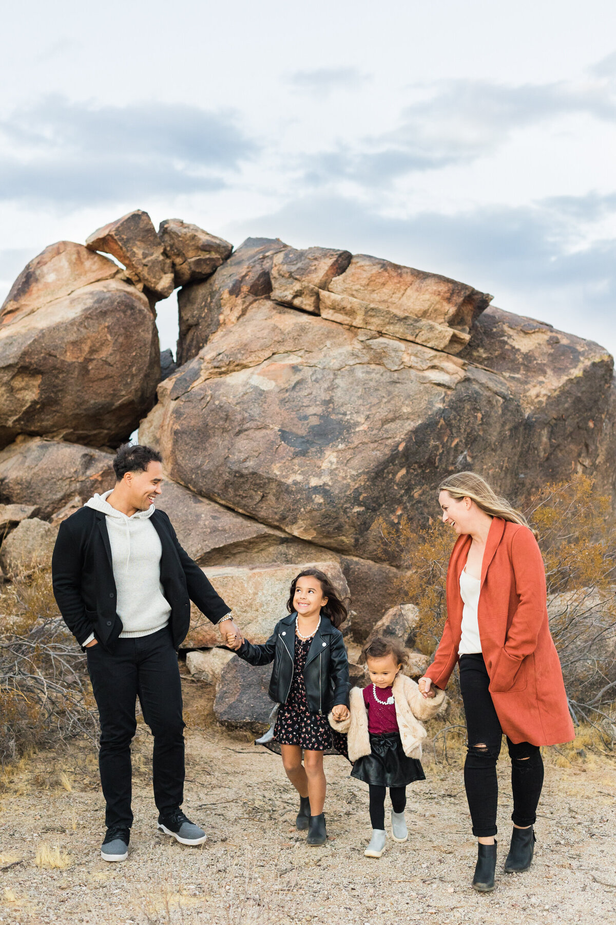 family smiling together in Phoenix desert