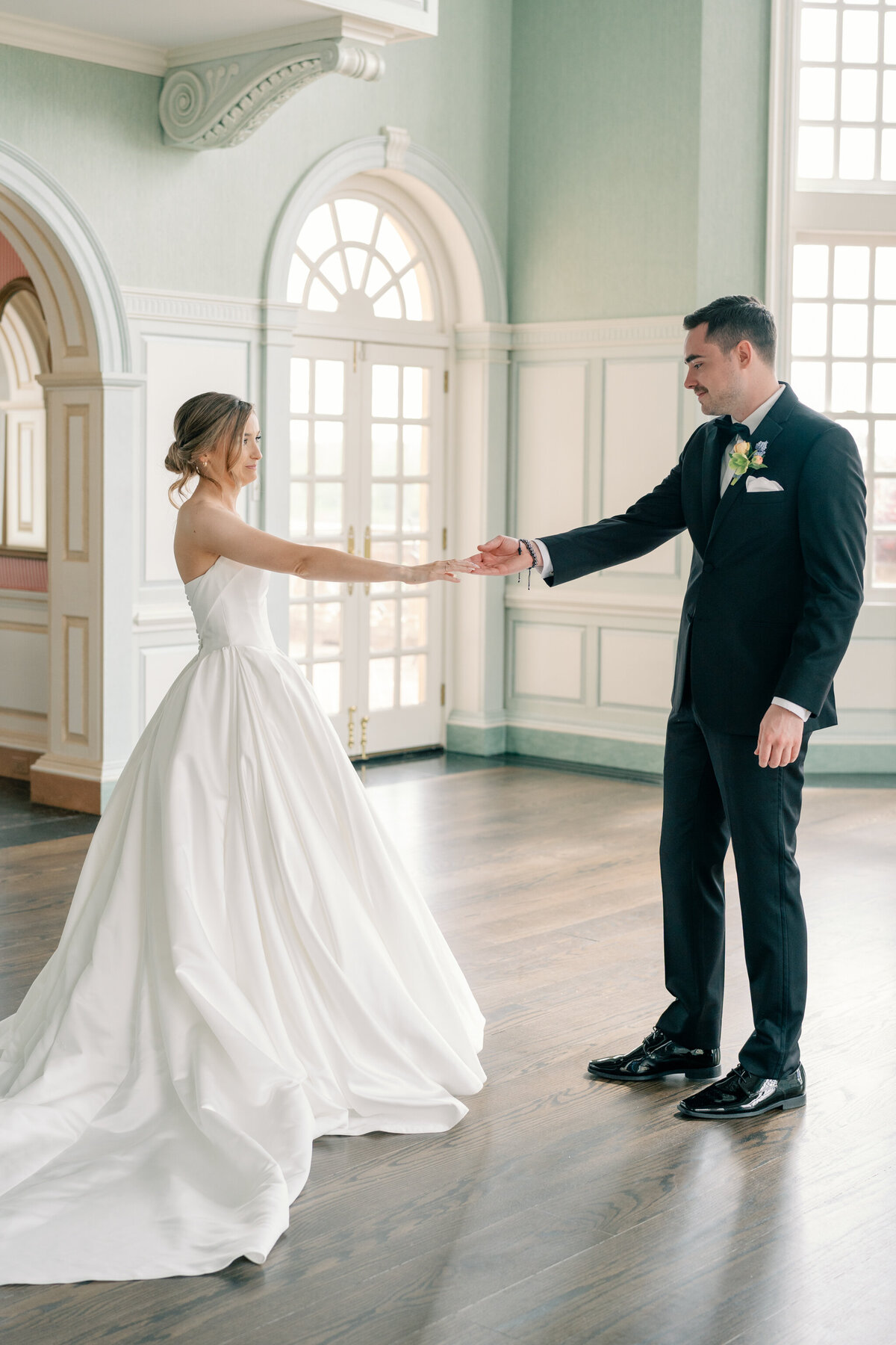 Wedding at the Estate at River Run in Maidens, VA | Wedding Photographer in Richmond | bride and groom looking at each other with outstretched hands during first look at the Estate at River Run