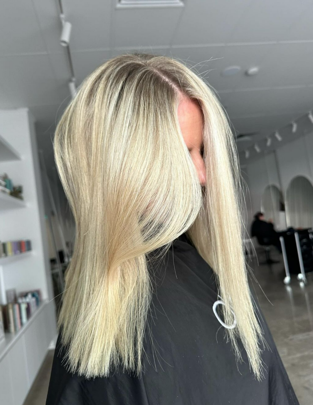 Girl with bright blonde straight hair