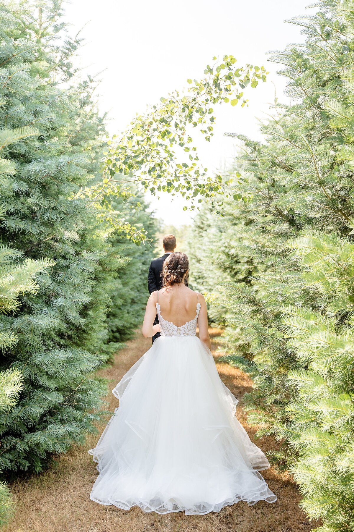 Bride-approaches-her-groom-before-the-first-look-at-arrowwood-farms