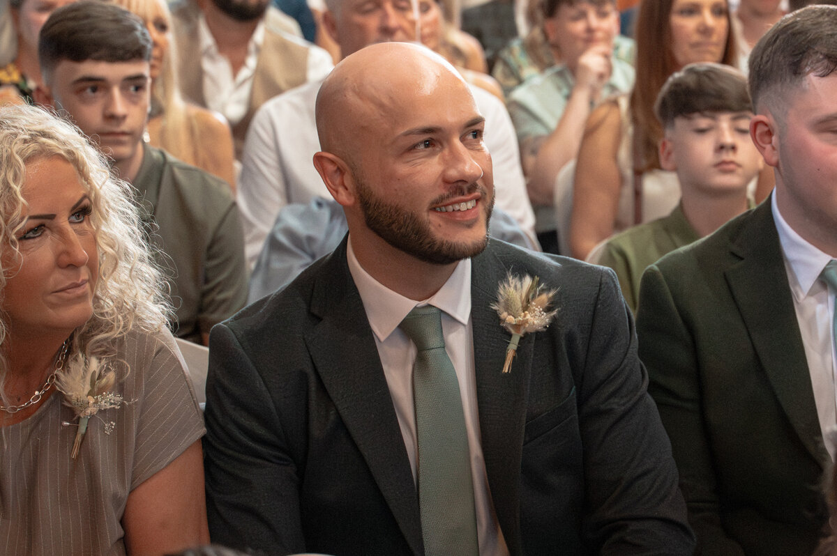 Candid emotional guest reactions during wedding at Worsley Court House - Carmen Sherred Photography Wedding Photographer 