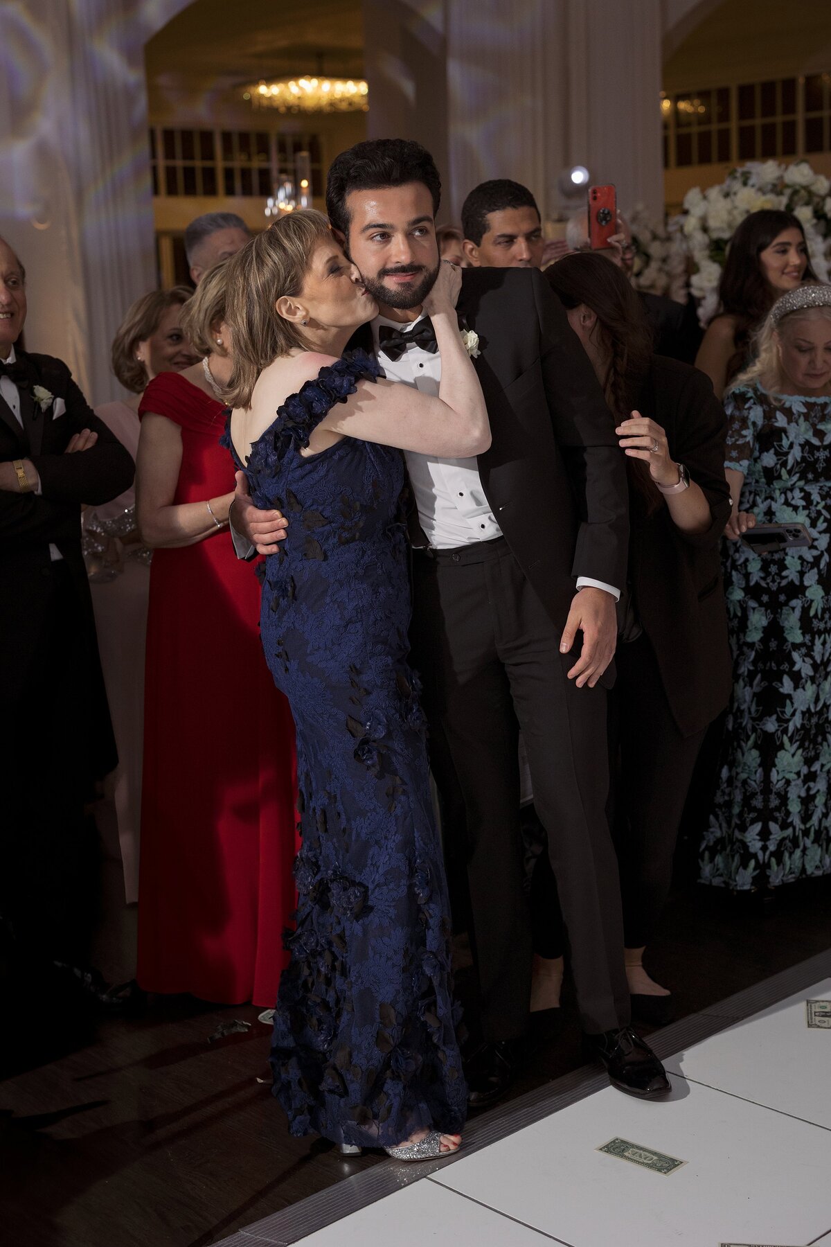 Guests enjoy the dance floor during wedding at Belle Mer Newport.