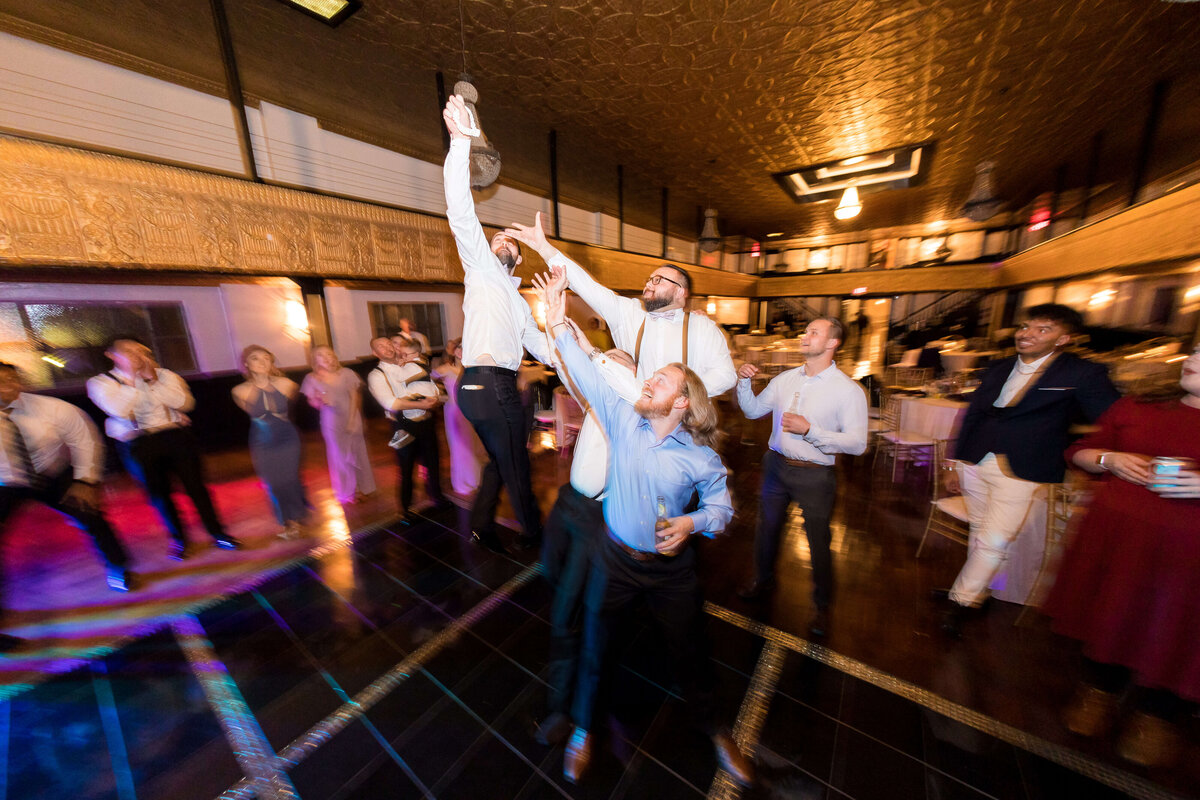 Garter toss at wedding reception at  The Gatsby in Shelbyville,KY