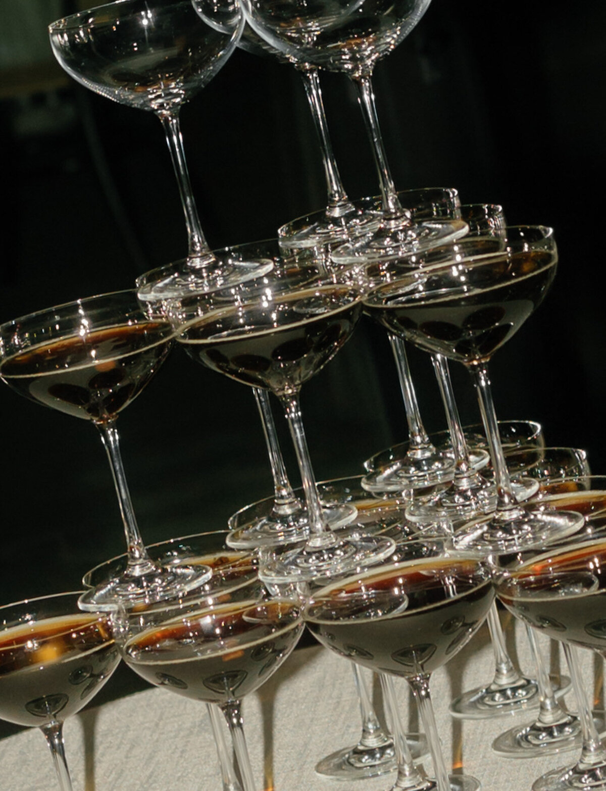 stacks of espresso martinis for a champagne tower, espresso martini tower at Shinola Hotel wedding