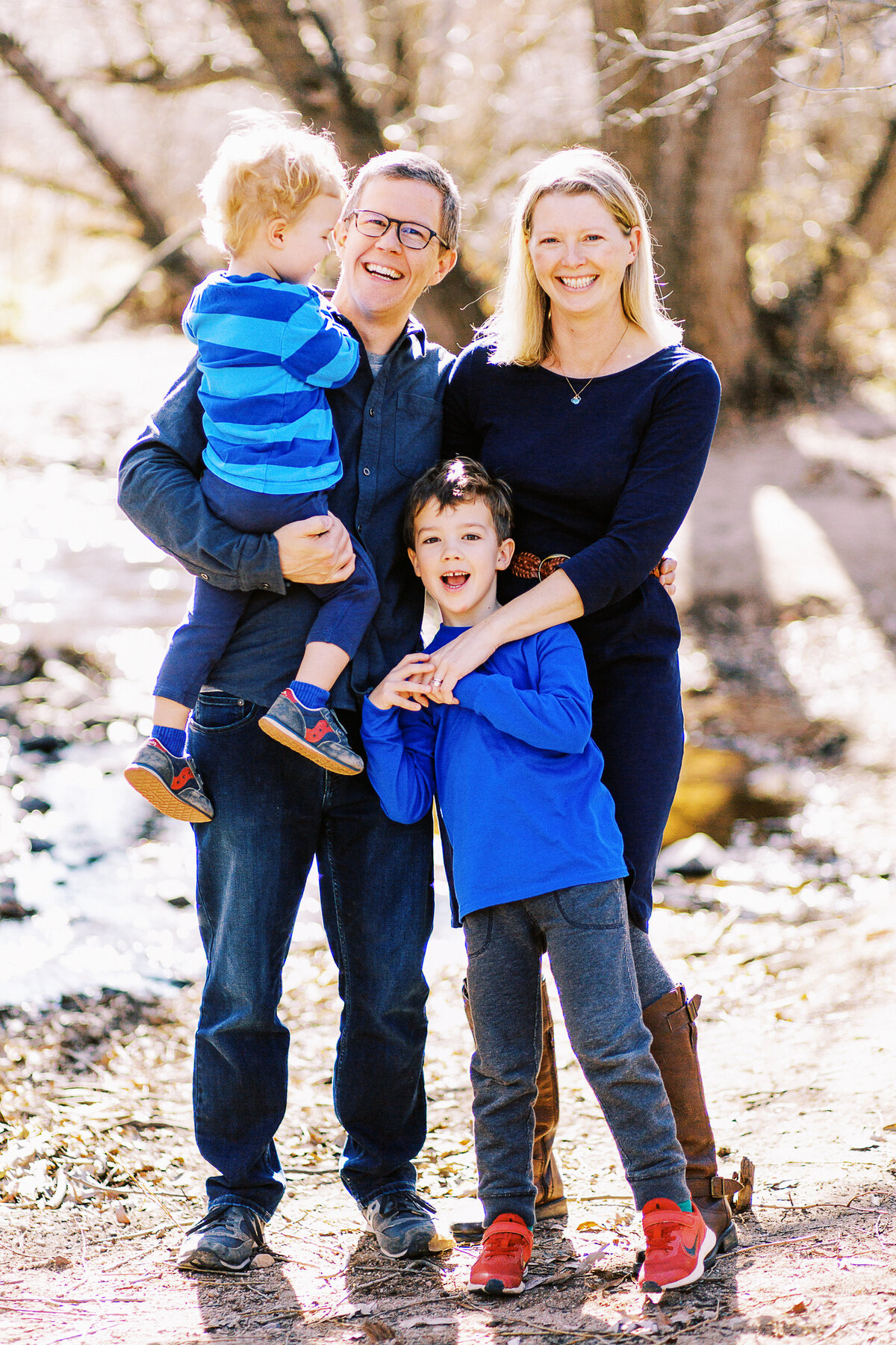family of four pose during boulder photoshoot