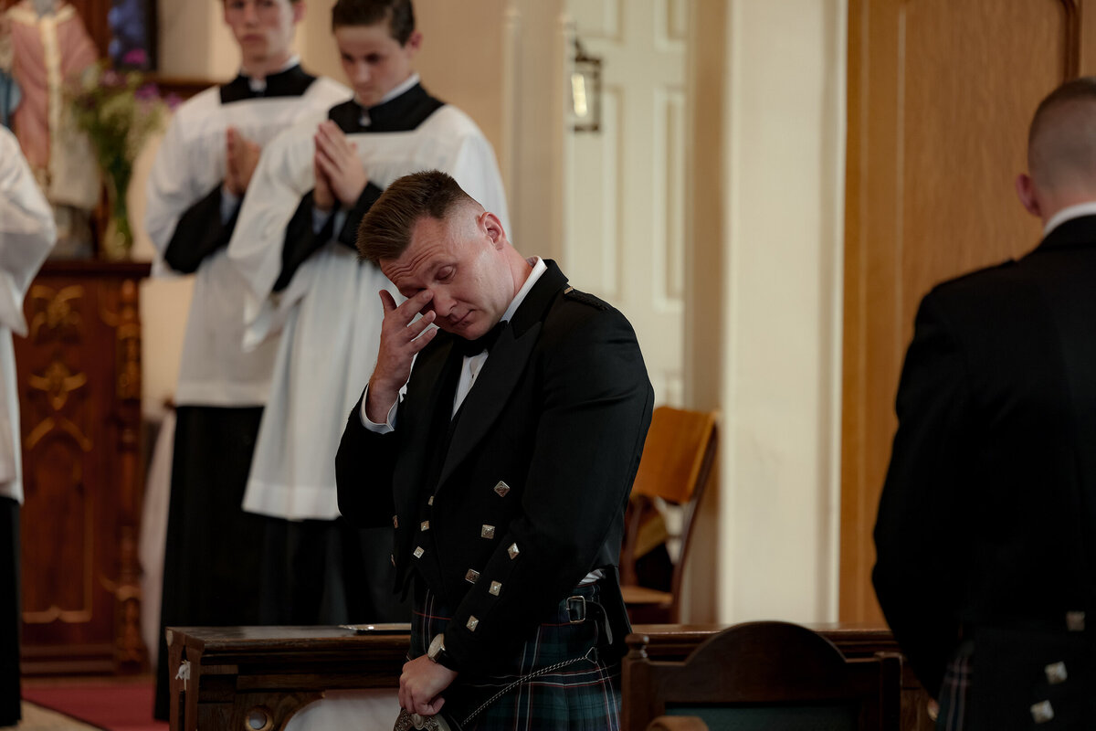 tearful-first-look-latin-mass-catholic-wedding