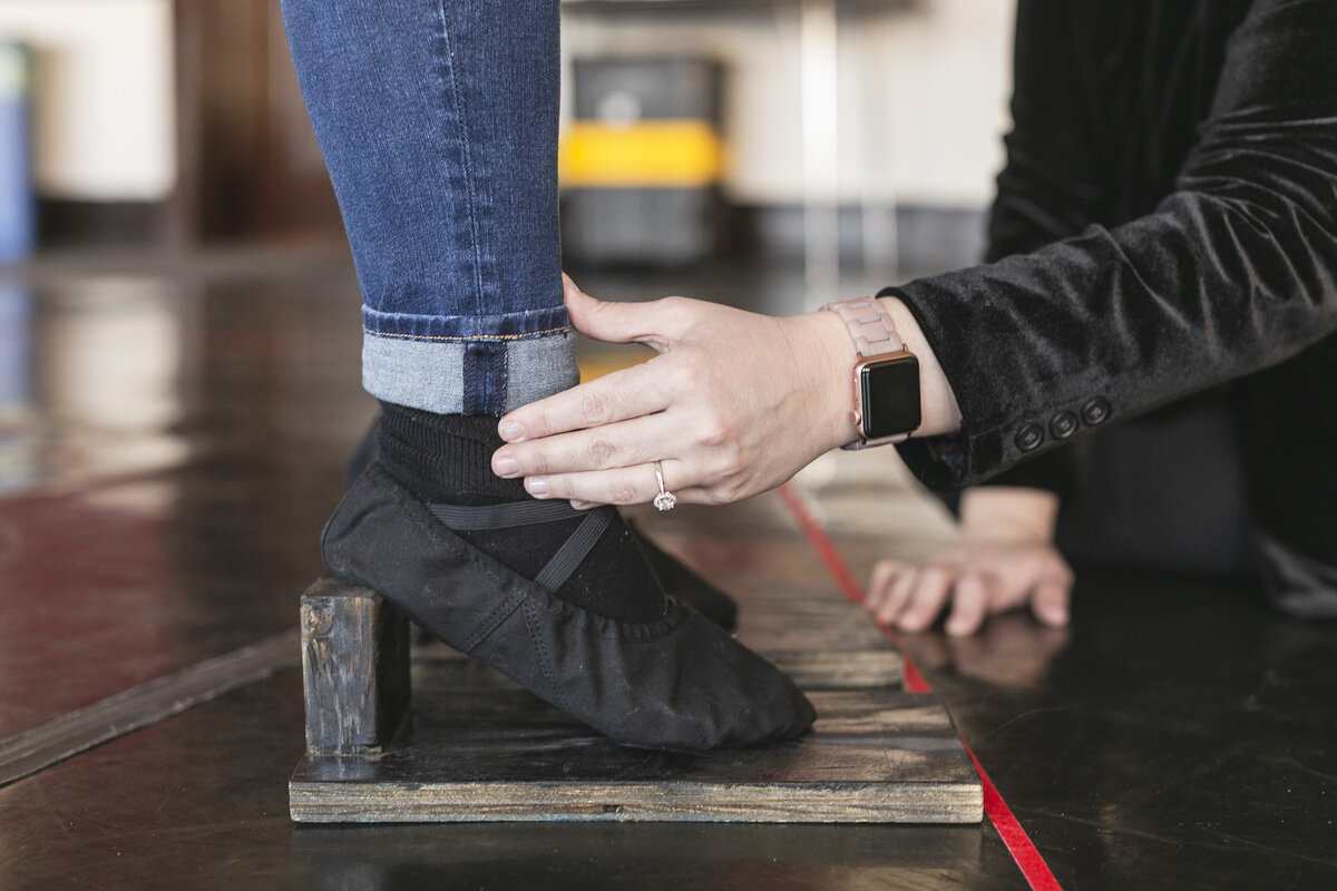 A singer's heeled shoe during a research session