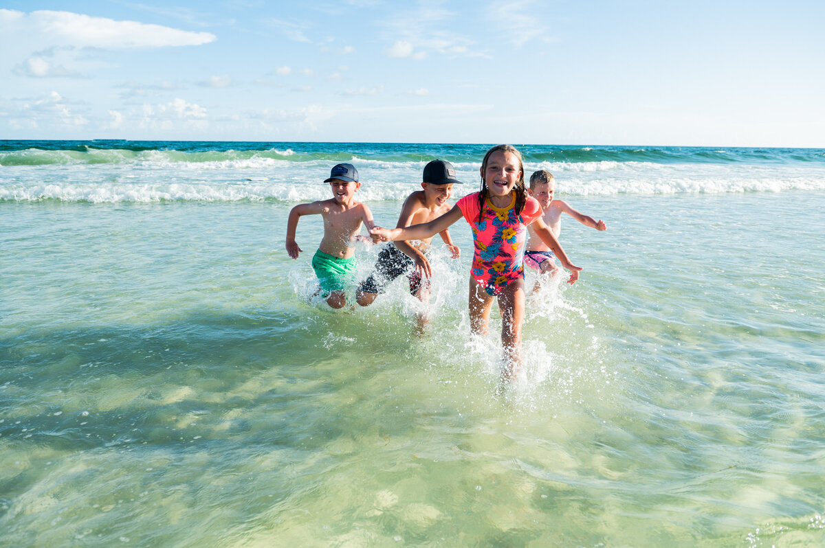 kids running out of beach- Seaside Beach