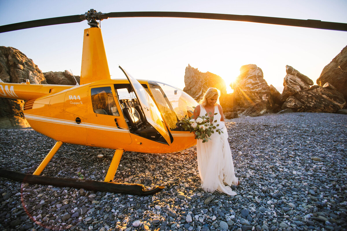 Bride next to helicopter