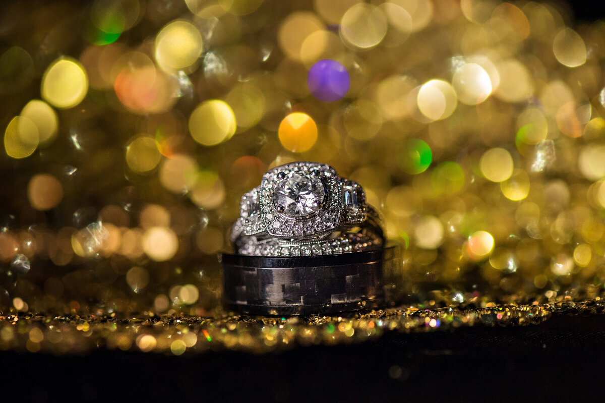 Large wedding ring with glittery background.