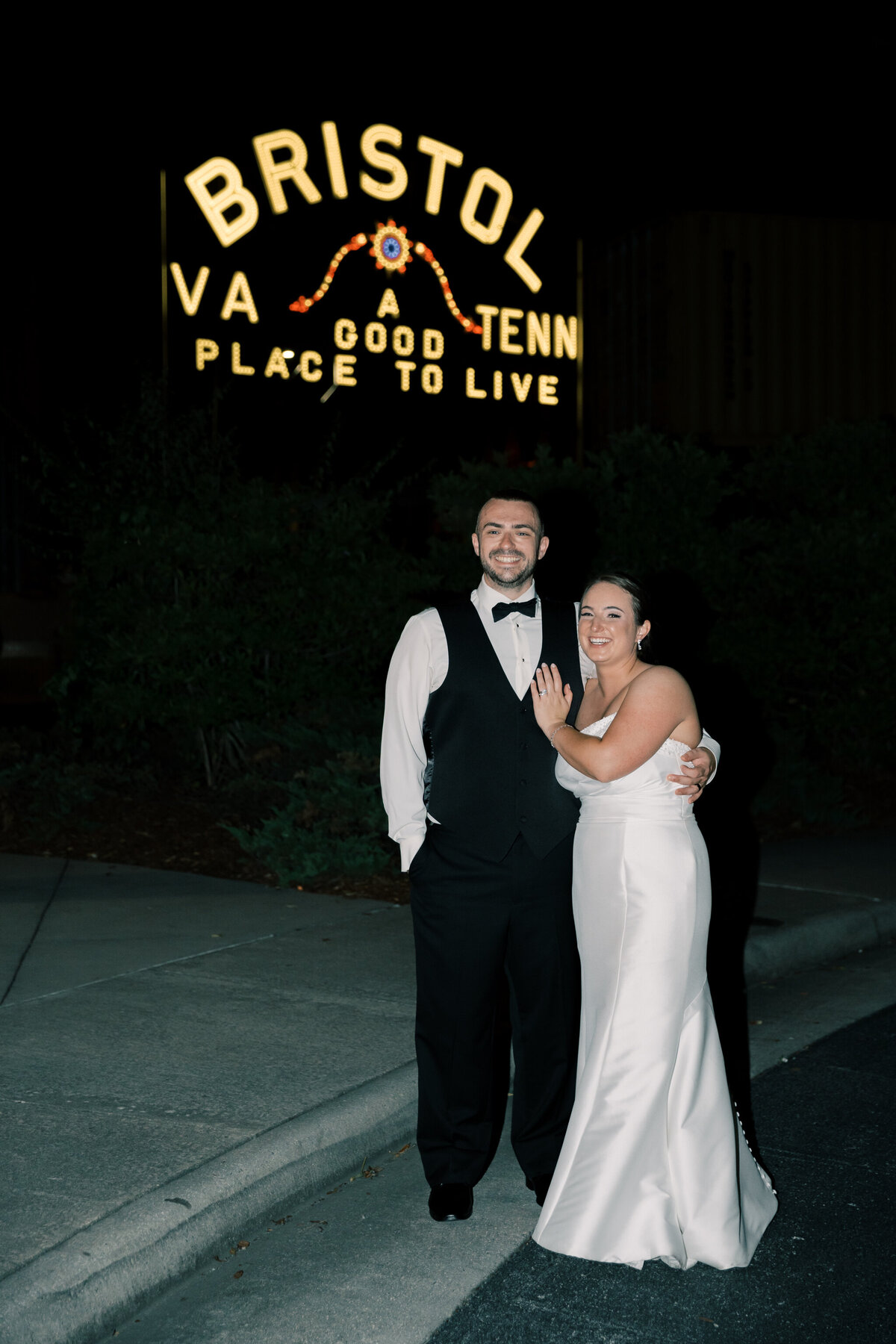 Bristol Train Station Wedding | bride and groom in front of the Bristol sign