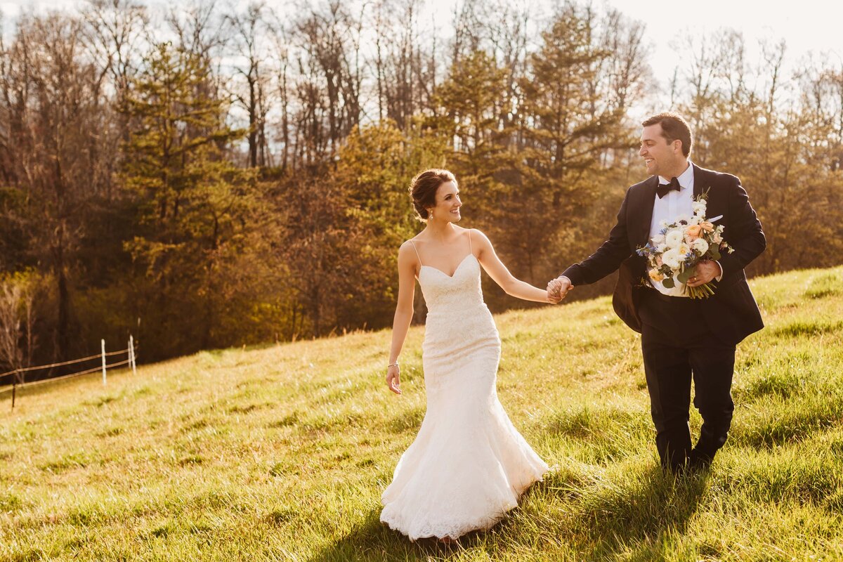 bride-groom-walking-field