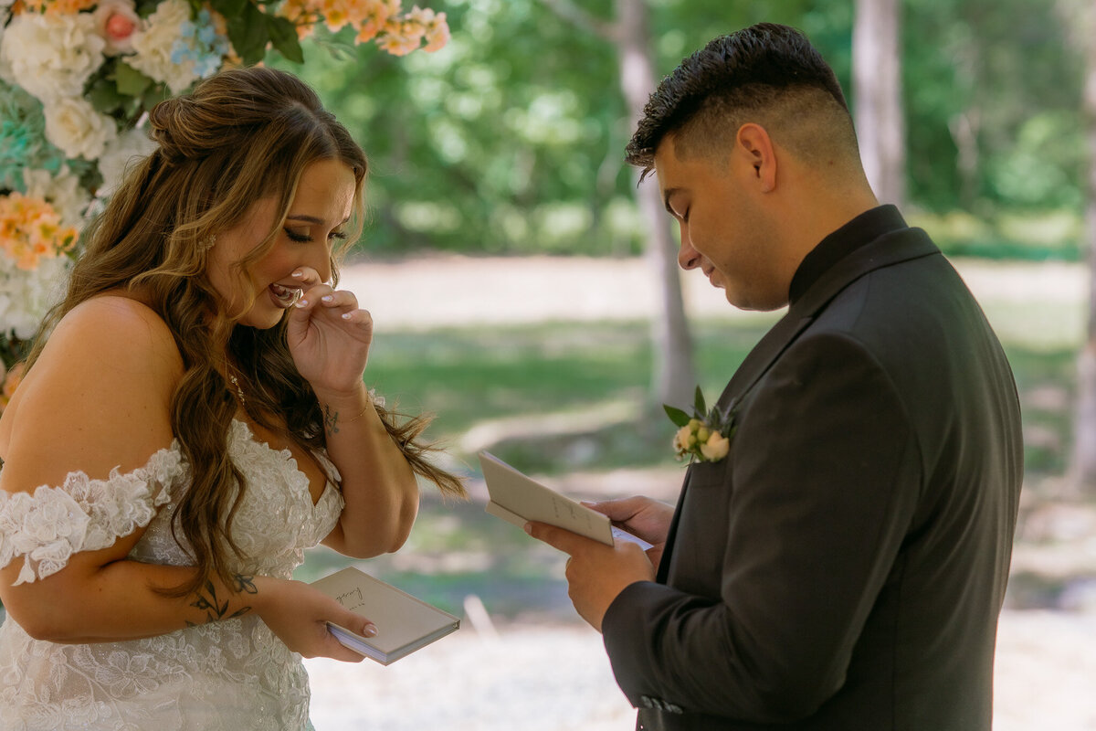 bride and groom sharing their vows during their private first-look.