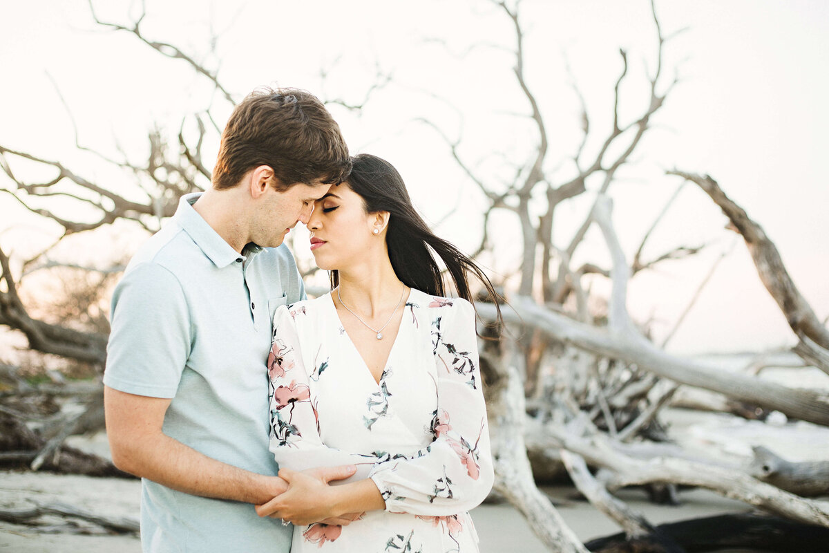 Sunset engagement session on Driftwood Beach in Jekyll Island - Izzy and Co.