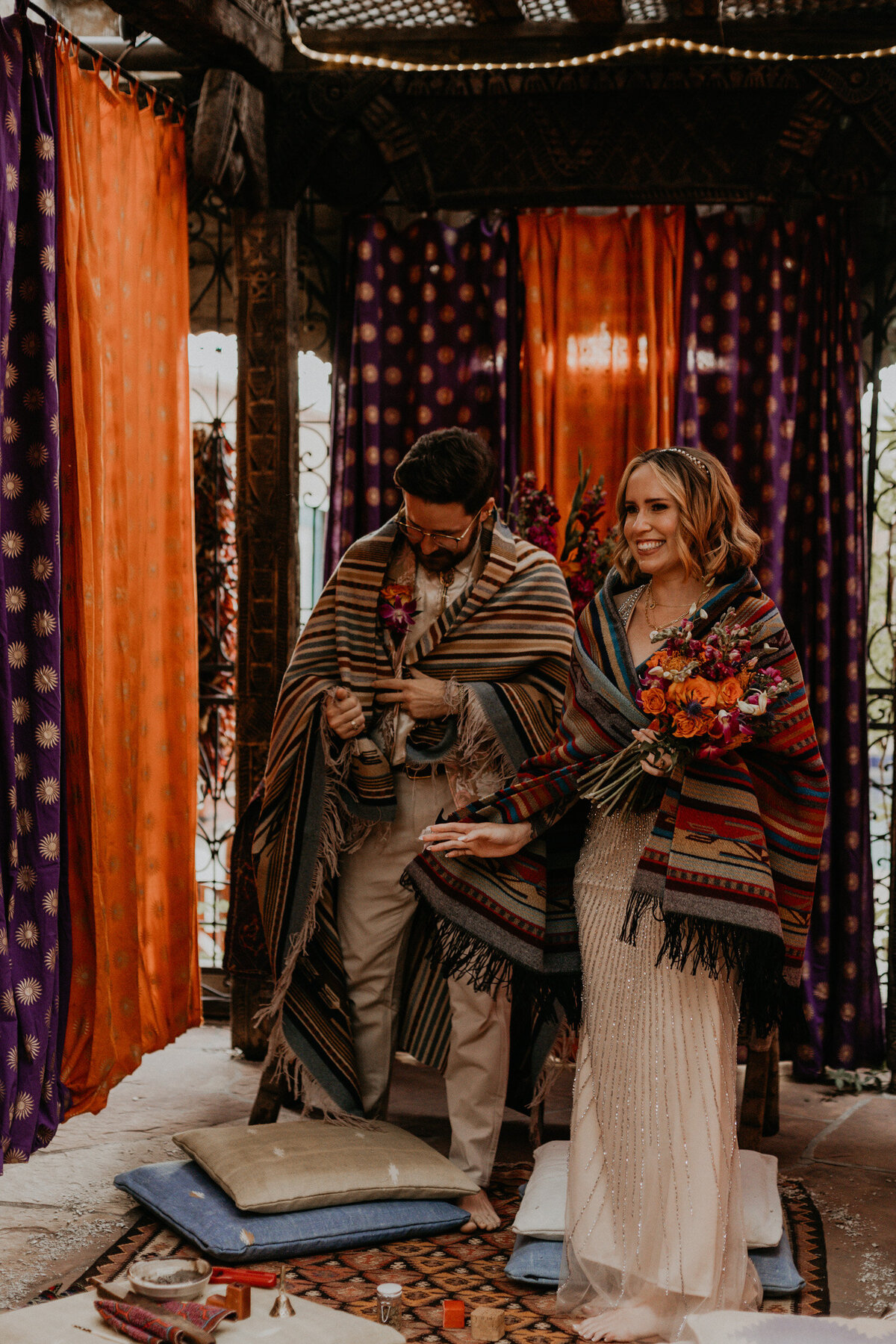 bride and groom recieving their blankets during a Lakota ceremony