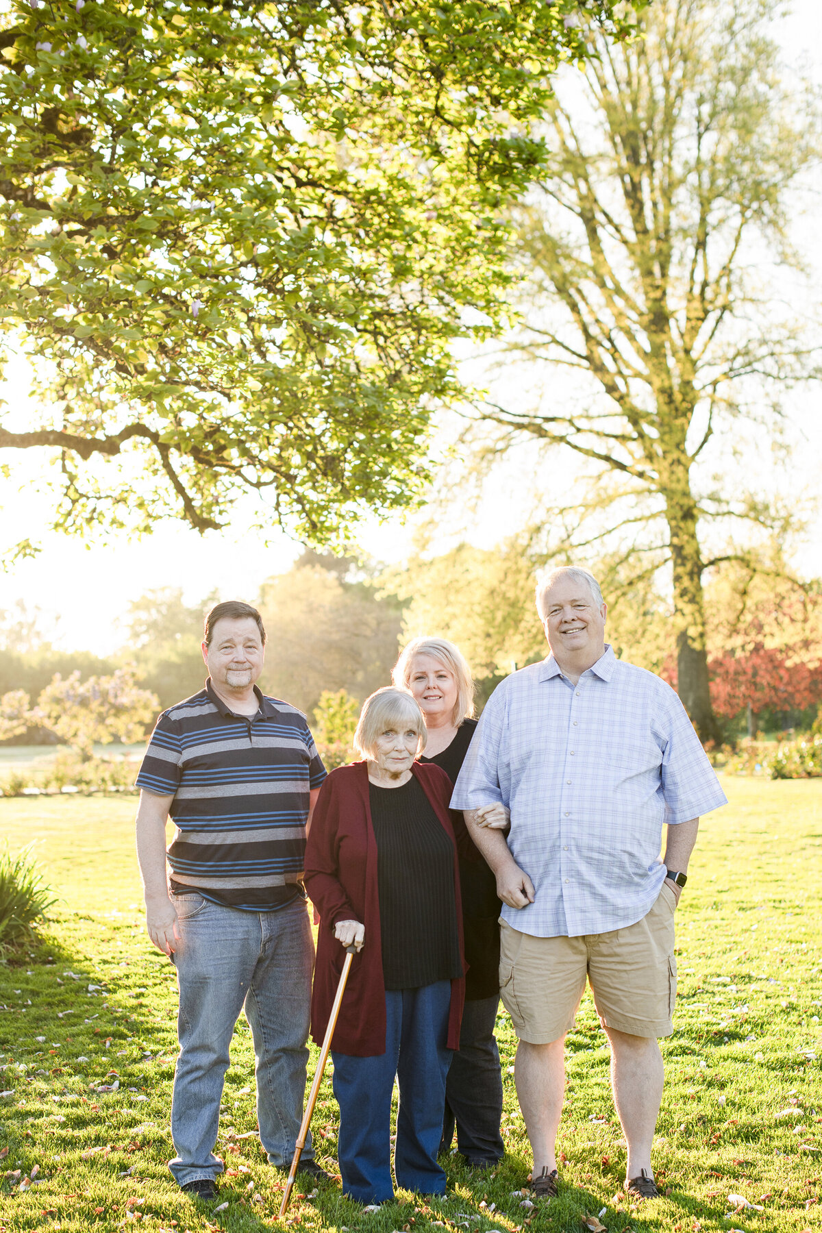 Mom and her three elder children all grown up at sunset in the Owen Rose Garden in Eugene Oregon