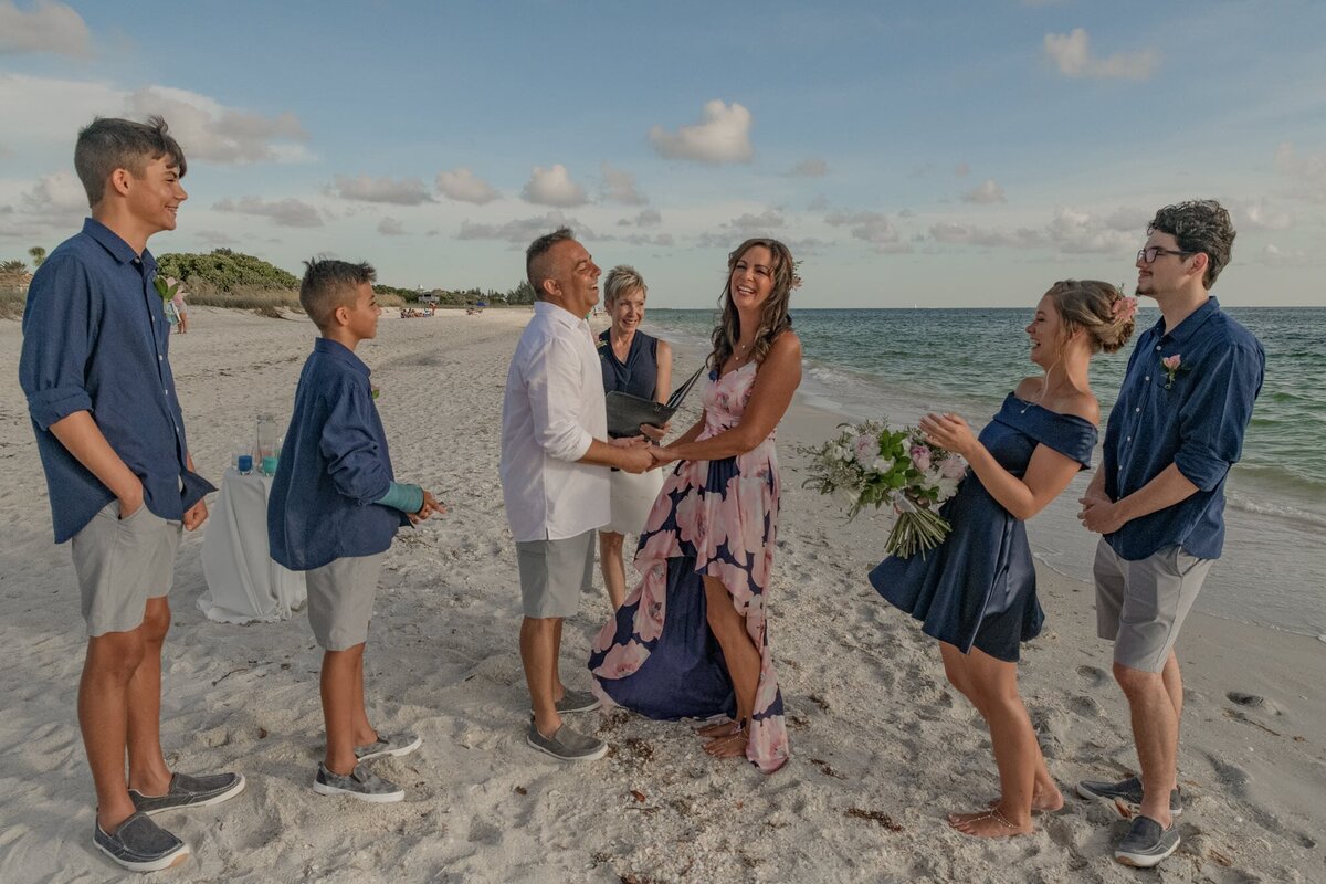 Family at beach wedding