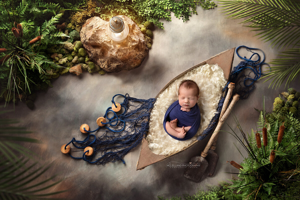 Newborn baby boy in nautical theme setup — photographed by a Milton newborn photographer