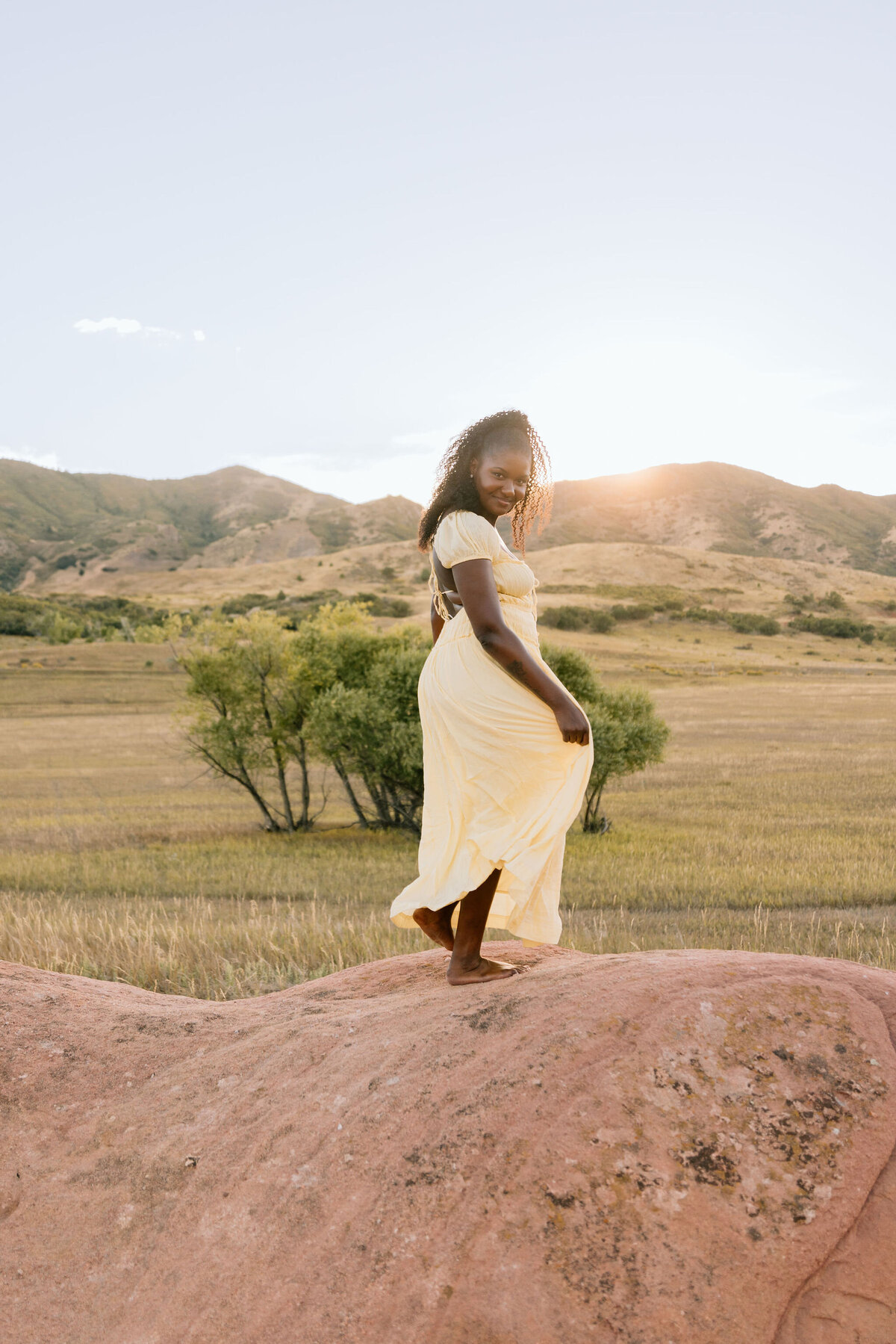 Golden hour photoshoot for a black solo traveler in Denver