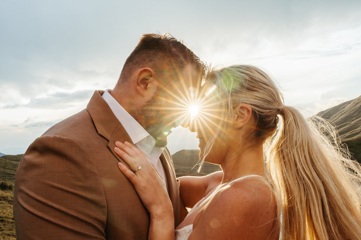 Close embrace during Dolomites elopement at golden hour