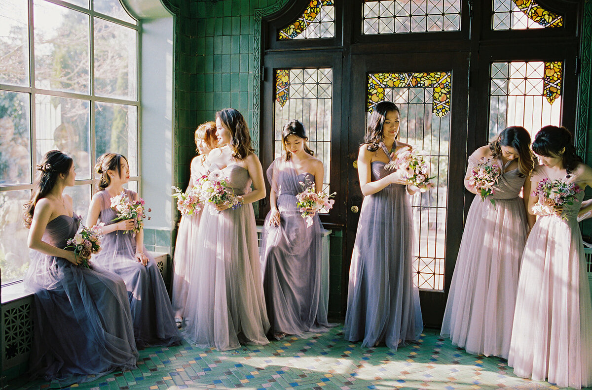 bridesmaids in jenny yoo dresses waiting