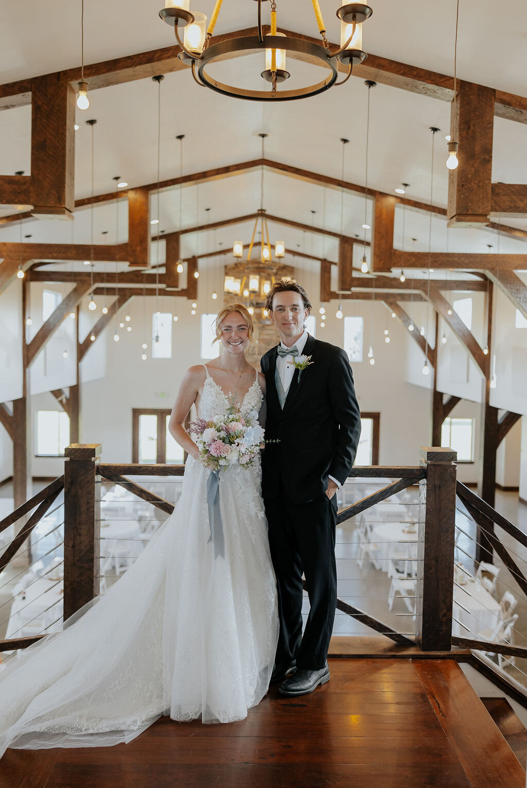 Couple on the upstairs balcony in the grand hall