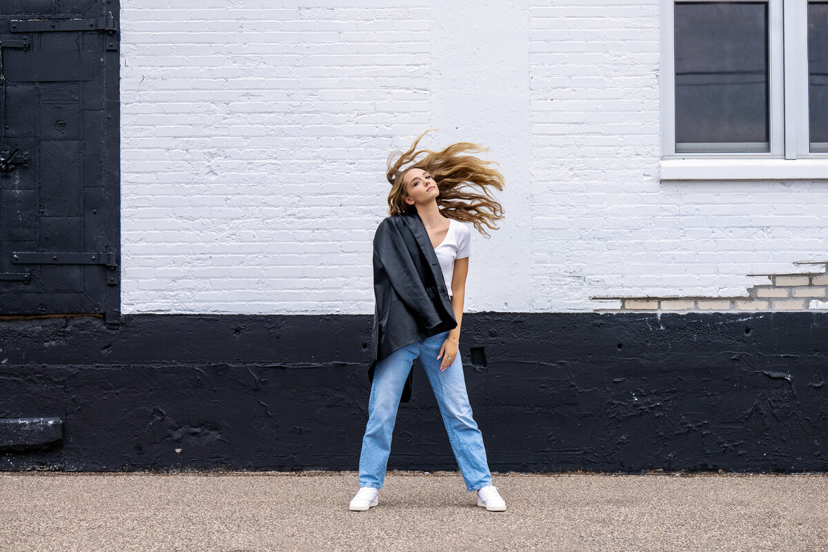 Mound Minnesota high school senior  photo of girl in leather jacket in urban setting