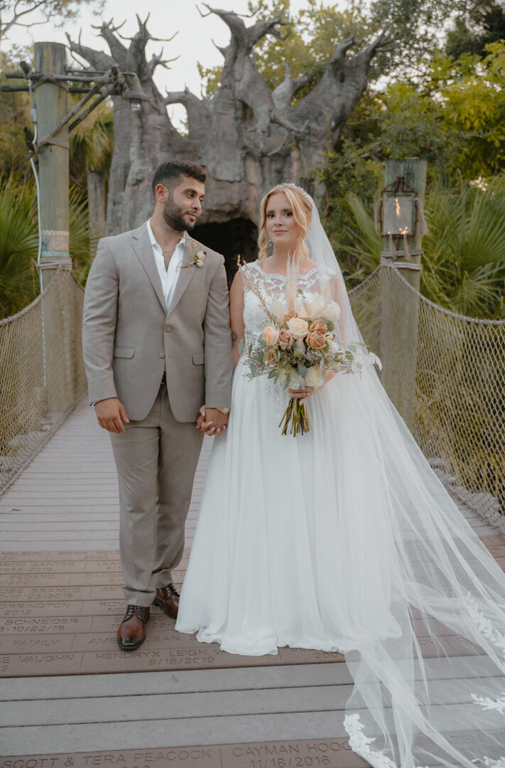 intimate wedding photos with bride and groom holding hands