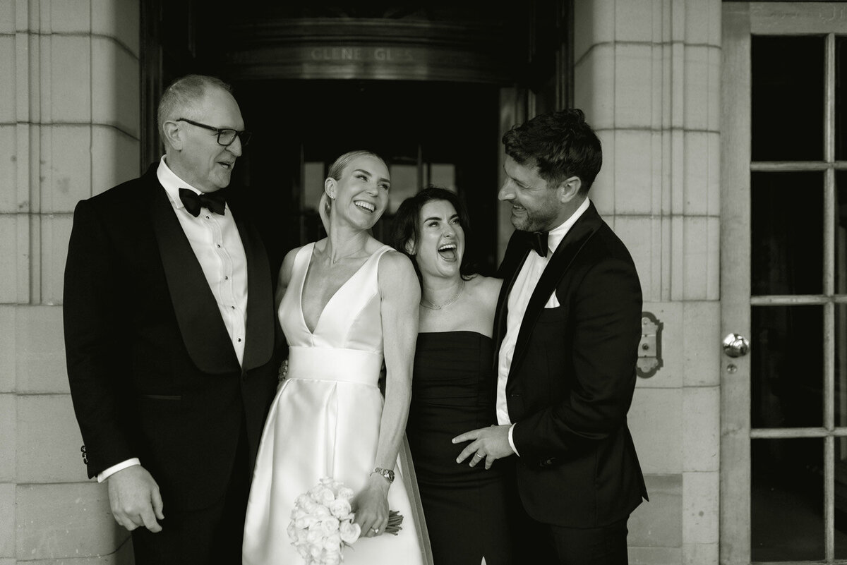 Editorial wedding photograph of family group on a wedding day at Gleneagles hotel, Scotland.  Image by luxury wedding photographer, Jill Cherry Porter.