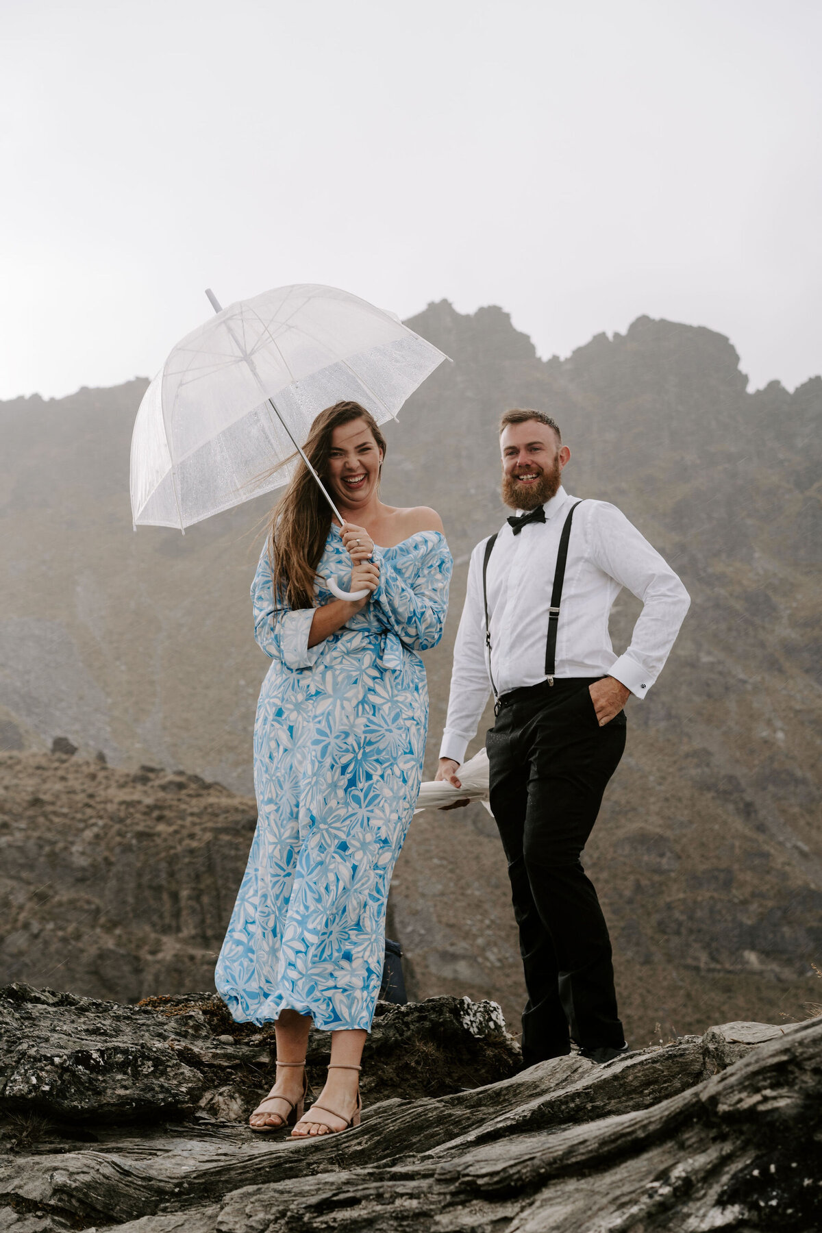The Lovers Elopement Co - wedding guests on top of mountain, heli wedding