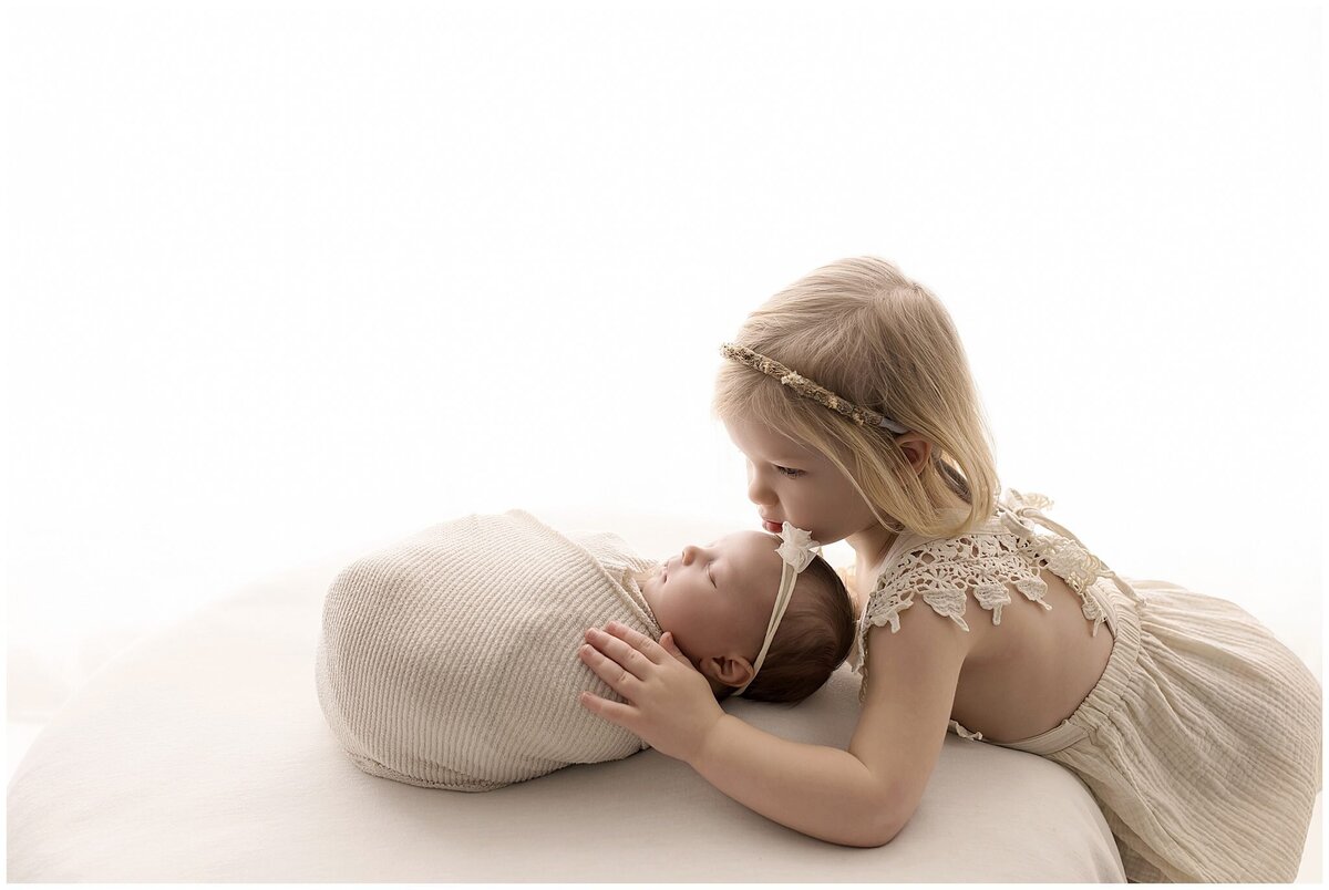 Soft light portrait of Medina baby and big sister