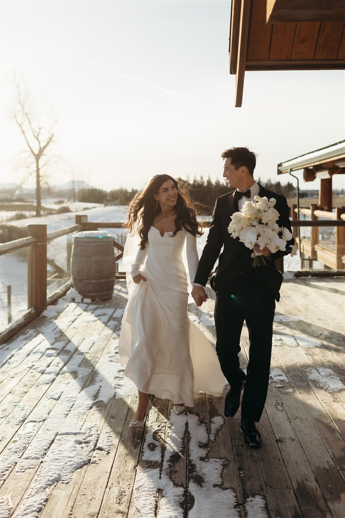 bride and groom laughing