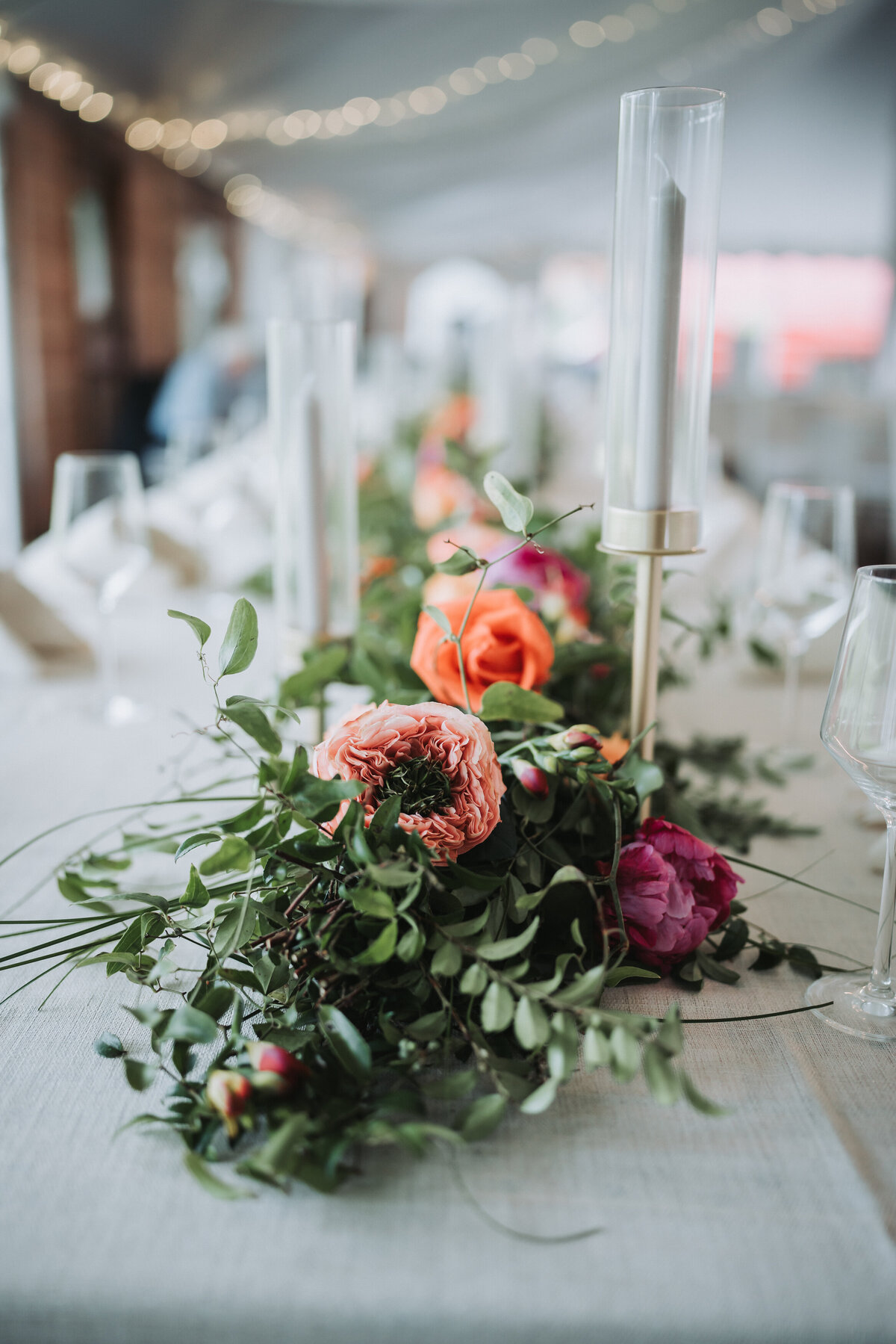 Beautiful floral bouquet on an arrange table setting before the reception.