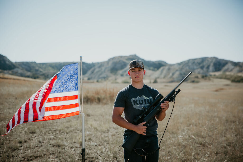 Portrait of young man with American Flag