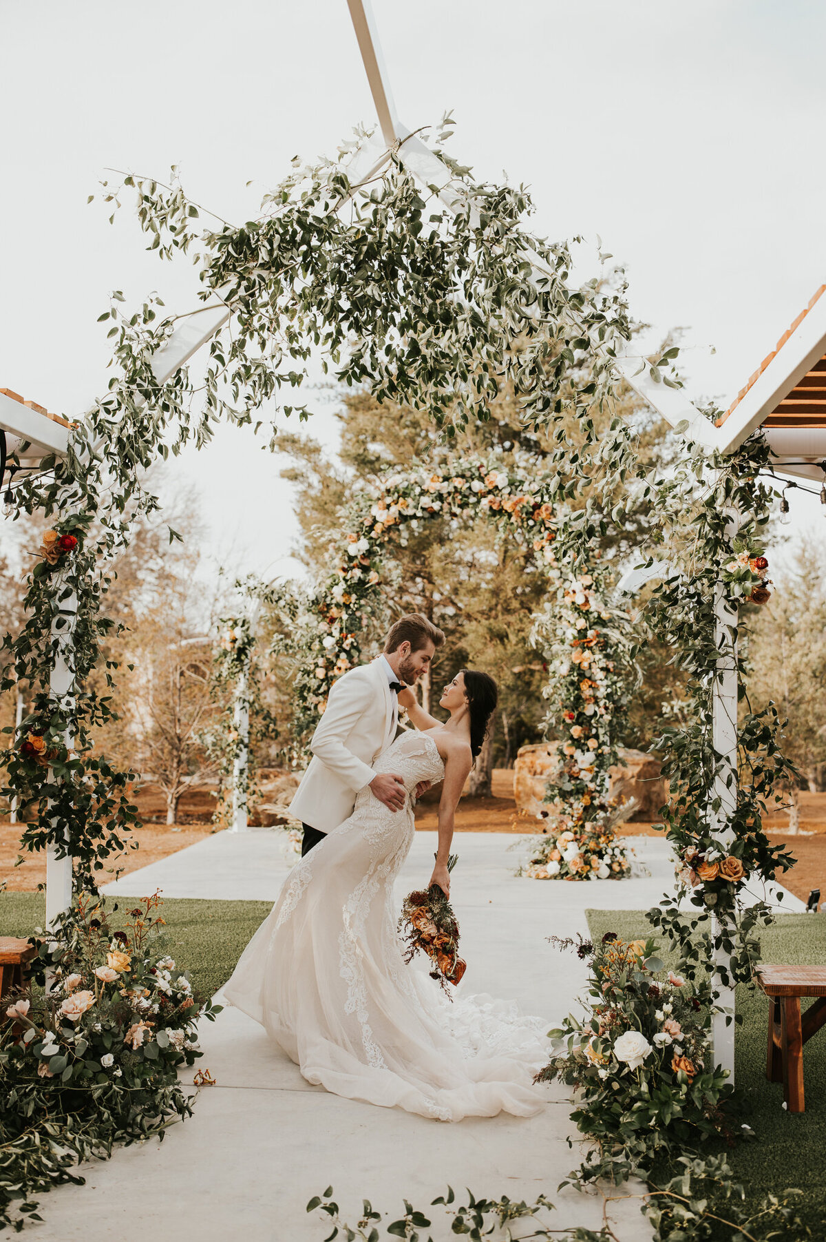 Groom holding his new wife