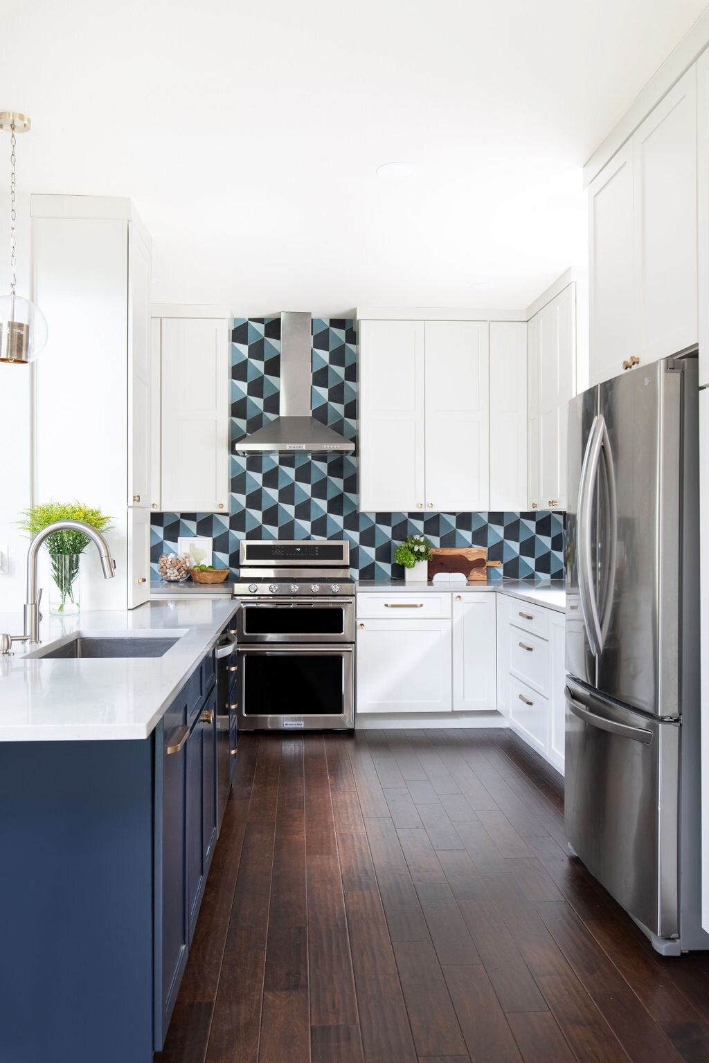 hello-home-austin-contemporary-navy-and-white-kitchen-remodel-patterned-backsplash-built-in-pantry-dark-wood-floors-9