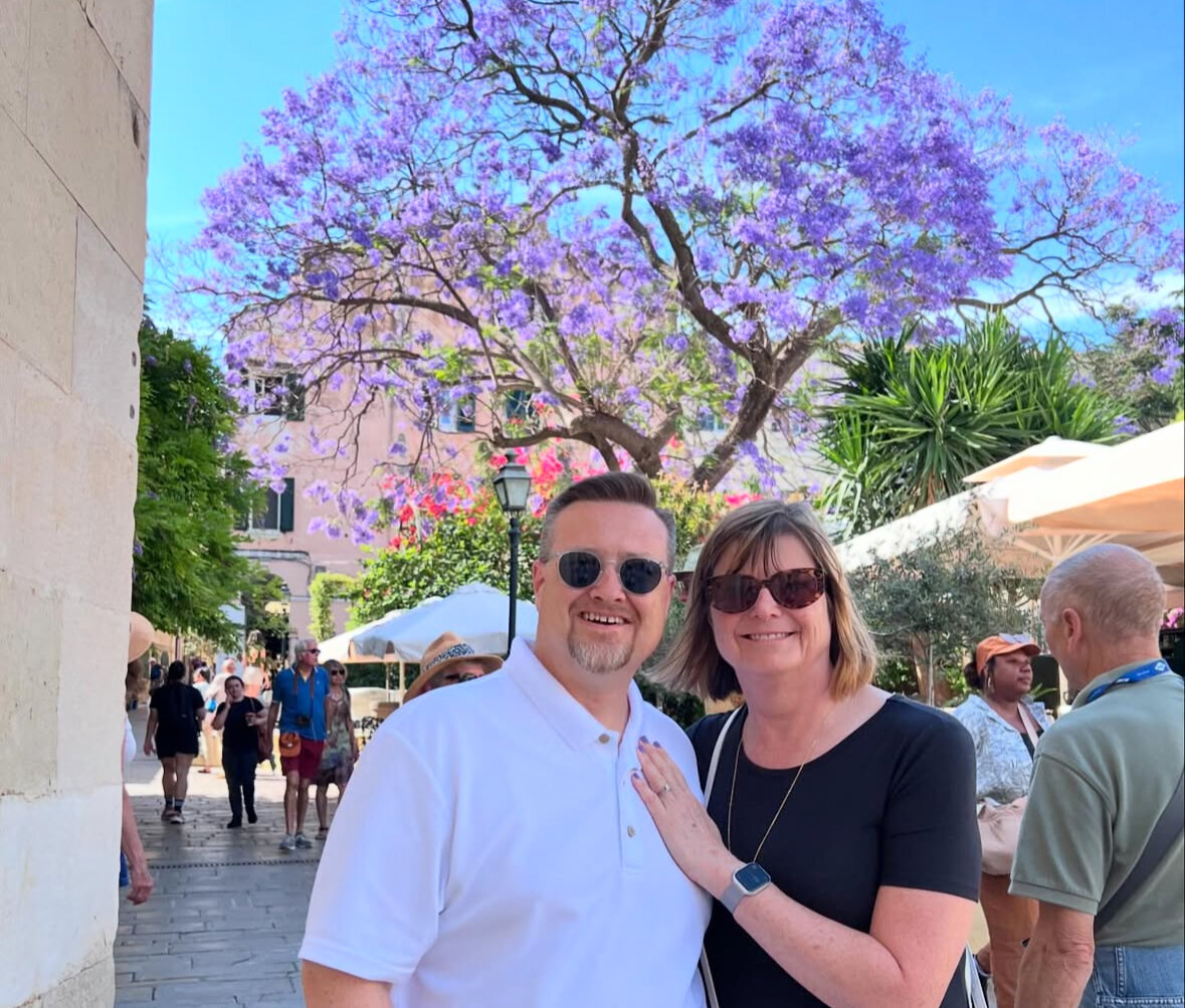 Pink Tree Blossoms with Jason and Kelly Smiling