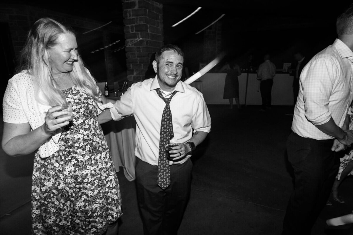 trans-man-and-wife-at-wedding-reception