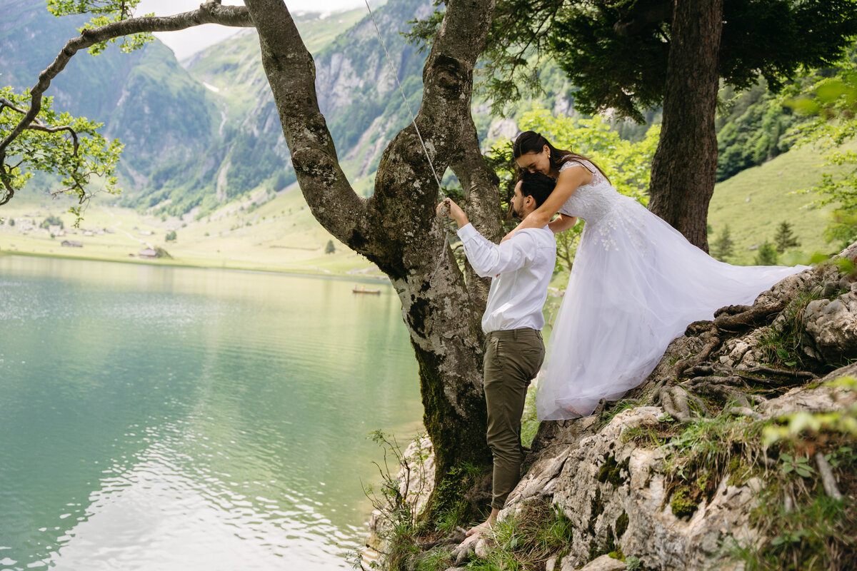 Seealpsee rope swing with bride and groom