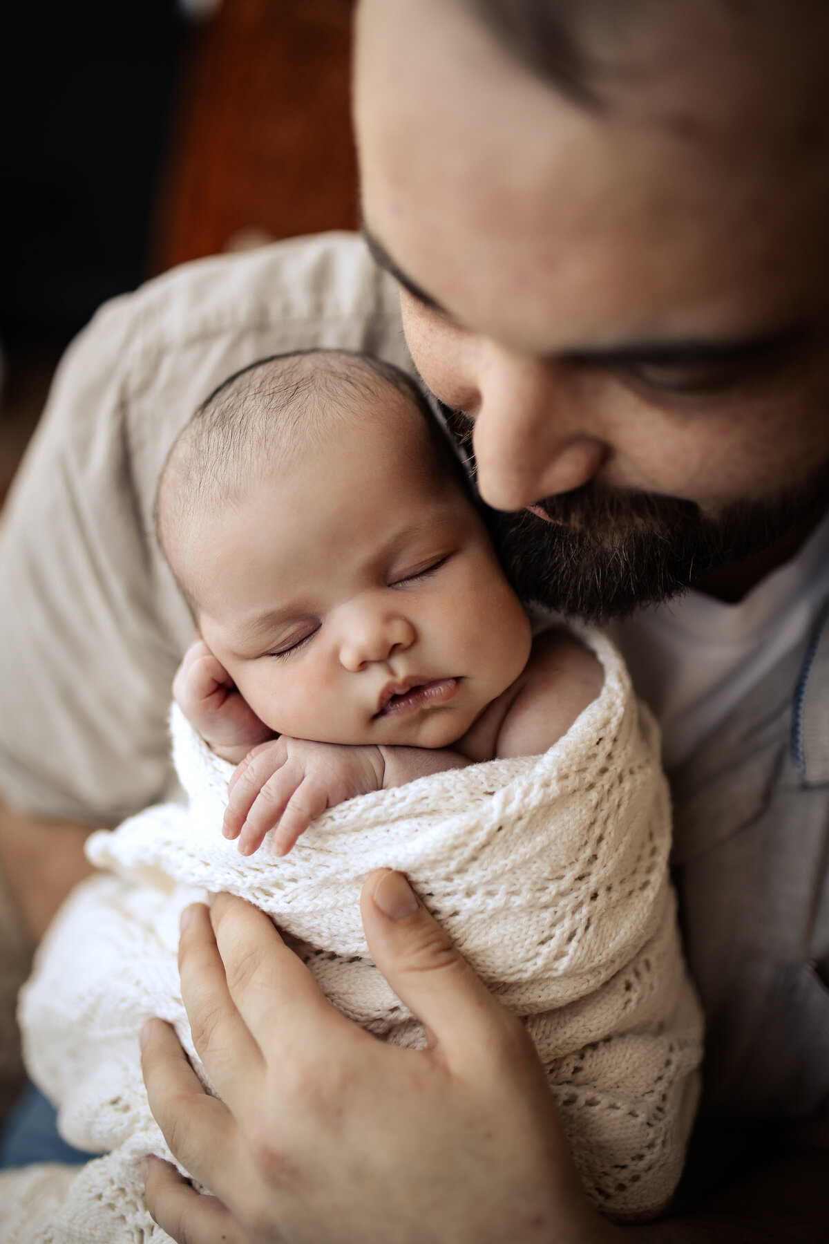 Newborn baby yawning peacefully in a cozy Hawke’s Bay home – heartwarming newborn photography by a local Hawke’s Bay photographer, capturing tender moments in Napier, Hastings, and Havelock North