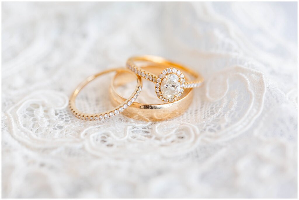engagement rings macro shot on wedding dress