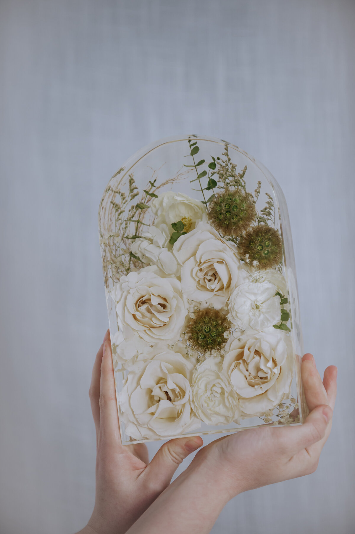 white rose and greenery bouquet preserved
