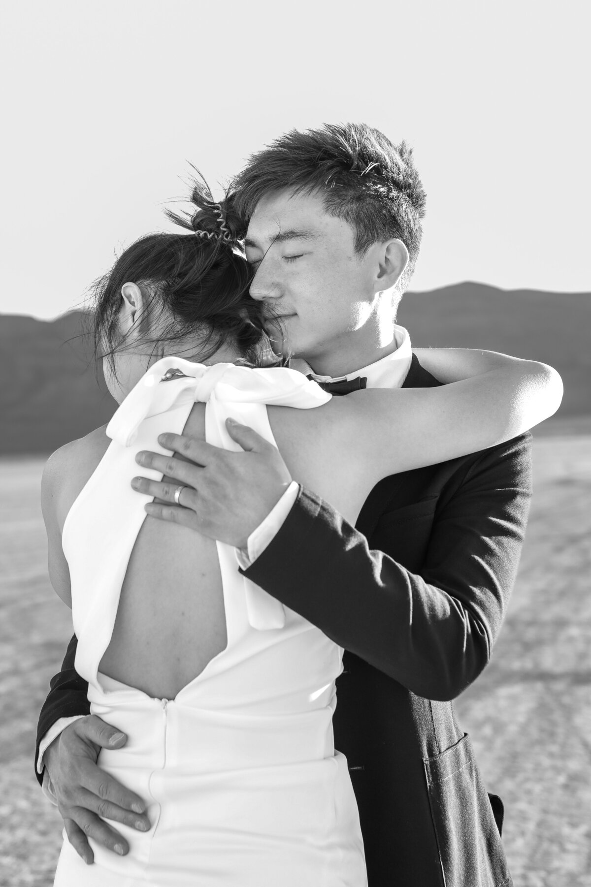 bride groom embrace