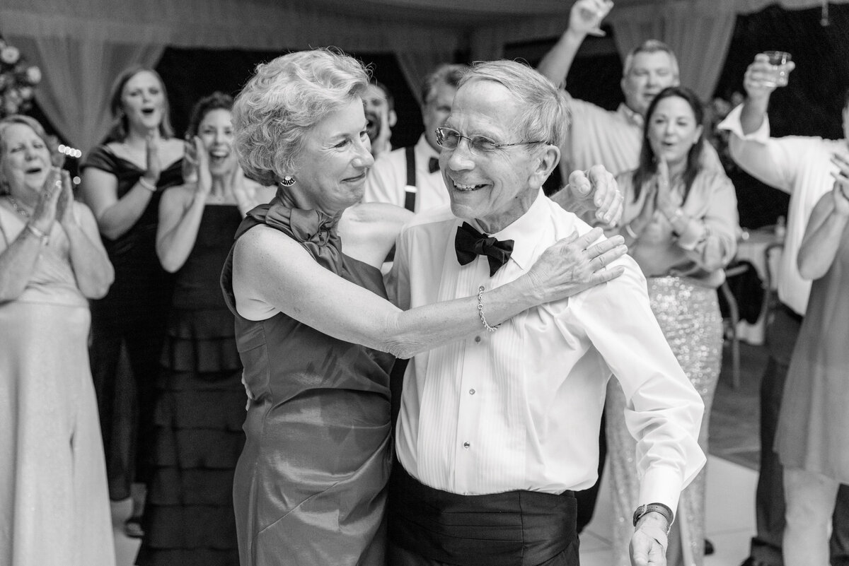 parents of the bride dance together