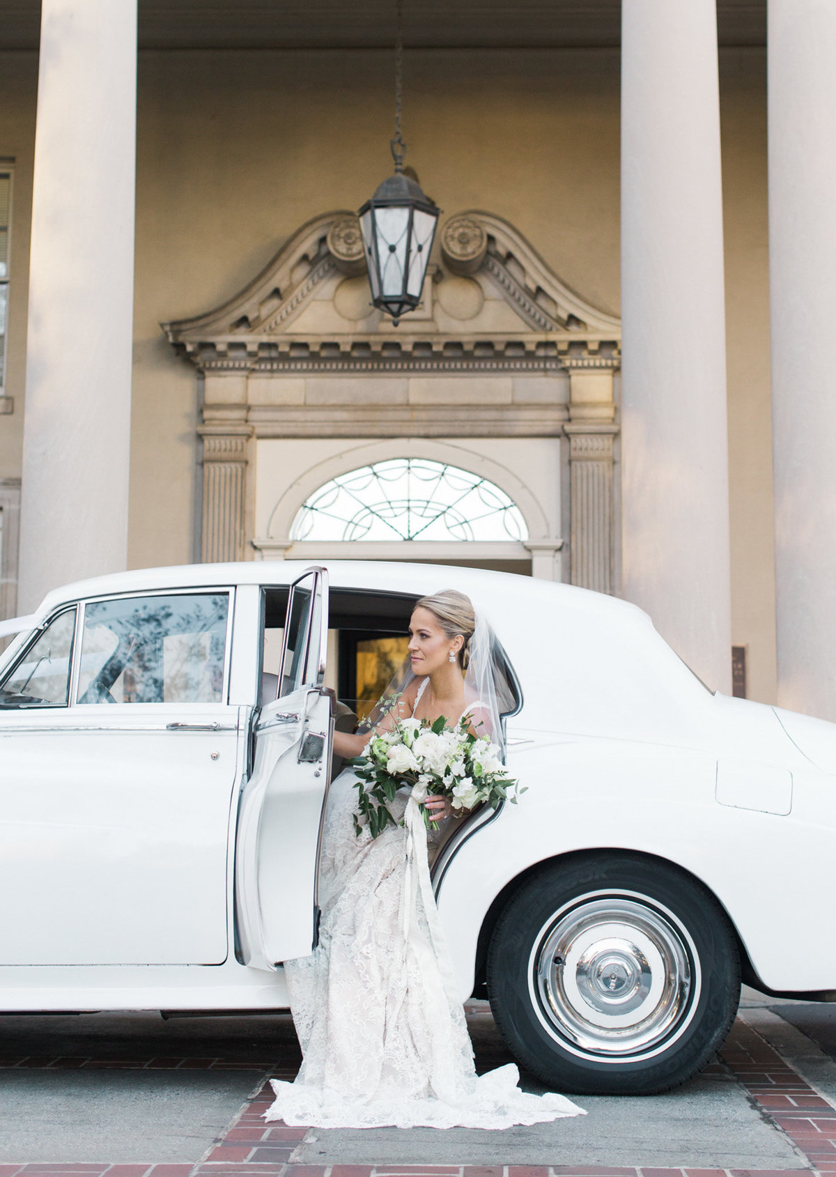 Classic car bridal portrait at the Biltmore Ballrooms.  Photo by Rebecca Cerasani.